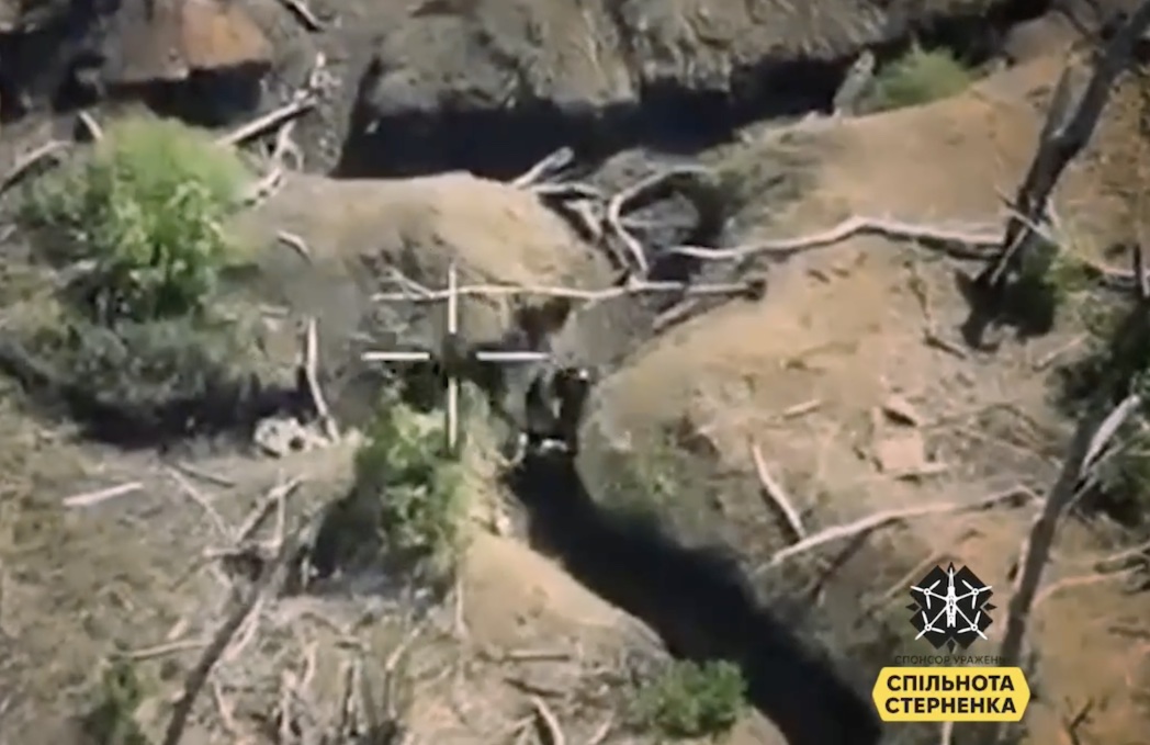 Russian-African mercenary appears to shoot himself in a trench after FPV near miss