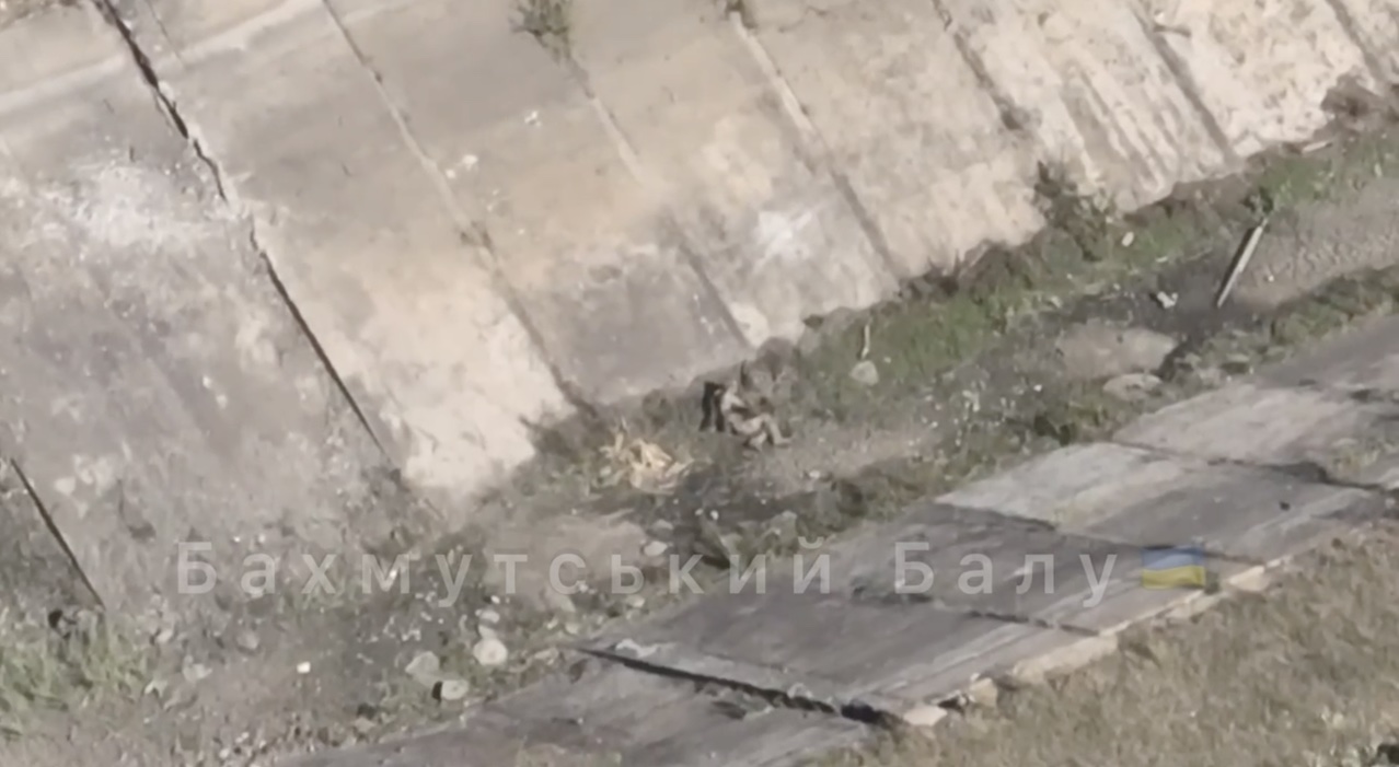 Russian soldier detonates his grenade on the bottom of empty channel