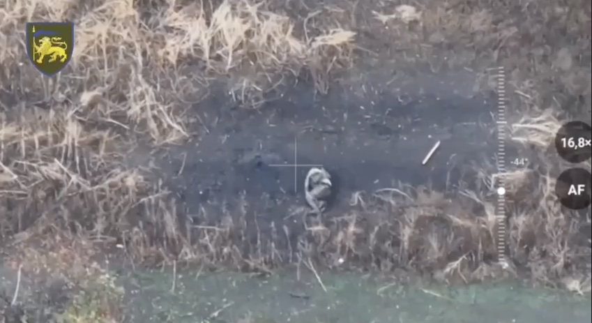 Russian is under FPV attack, runs but falls down. Appears to eventually detonate his own grenade