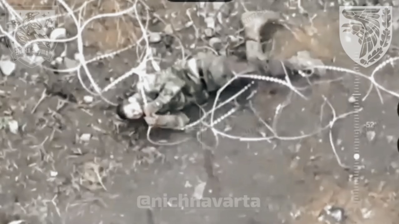 Russian soldier attempts to cut his throat violently with barbed wire