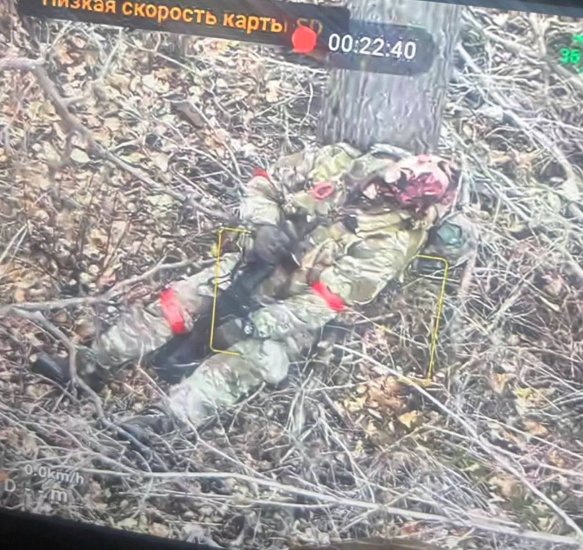 Photo of what appears to be Russian soldier having shot himself with his AK not long ago, his finger still on the trigger