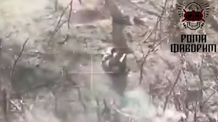 Russian receives direct FPV hit, is seen to shoot himself down on the ground