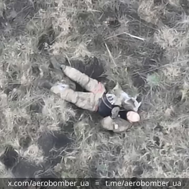 Unarmed Russian is walking alone, hit by a drone drop. In agony he destroys his phone demonstrating compliance, then proceeds to stab himself in the chest to no success, is hit by another drop soon after
