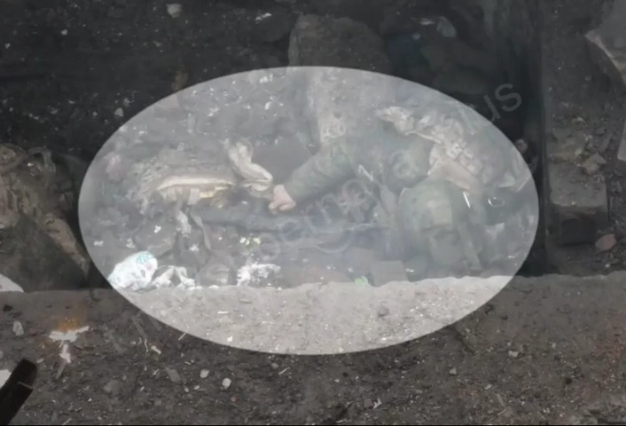 Injured by drone dropped grenade, Russian shoots himself while laying beside bodies of comrades