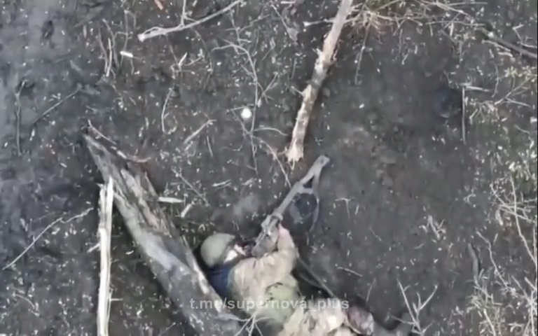 Drone wounds Russian, when returns to drop second grenade. The Russian is dead and appears to have shot himself