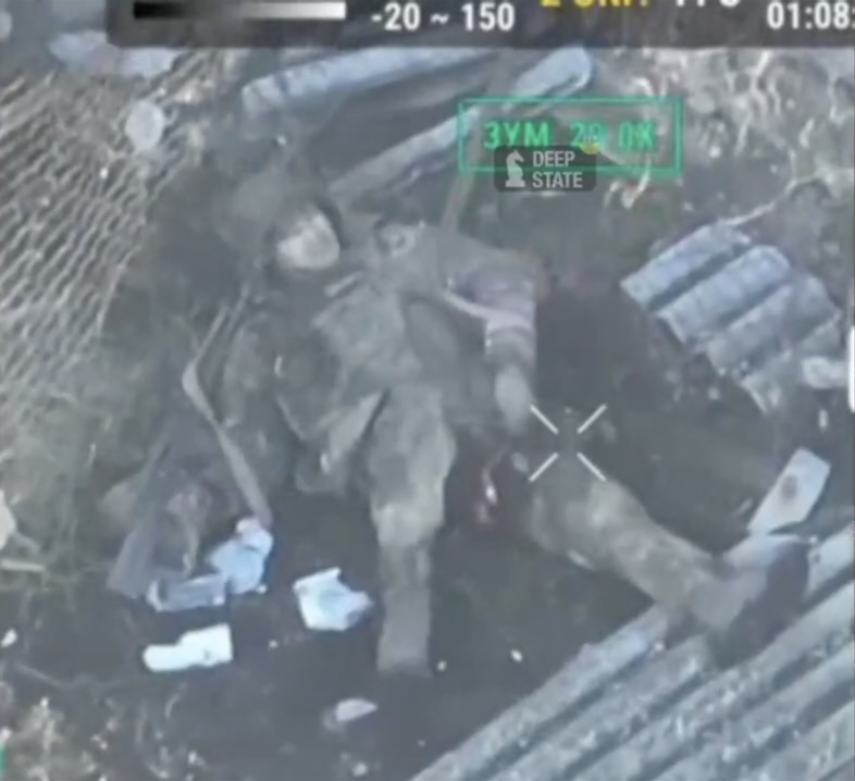 Russian is sitting in a wooden shelter, shoots himself with AK to his temple