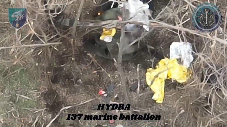 Russian sitting in the trench receives near hit, is seen shooting himself in the head