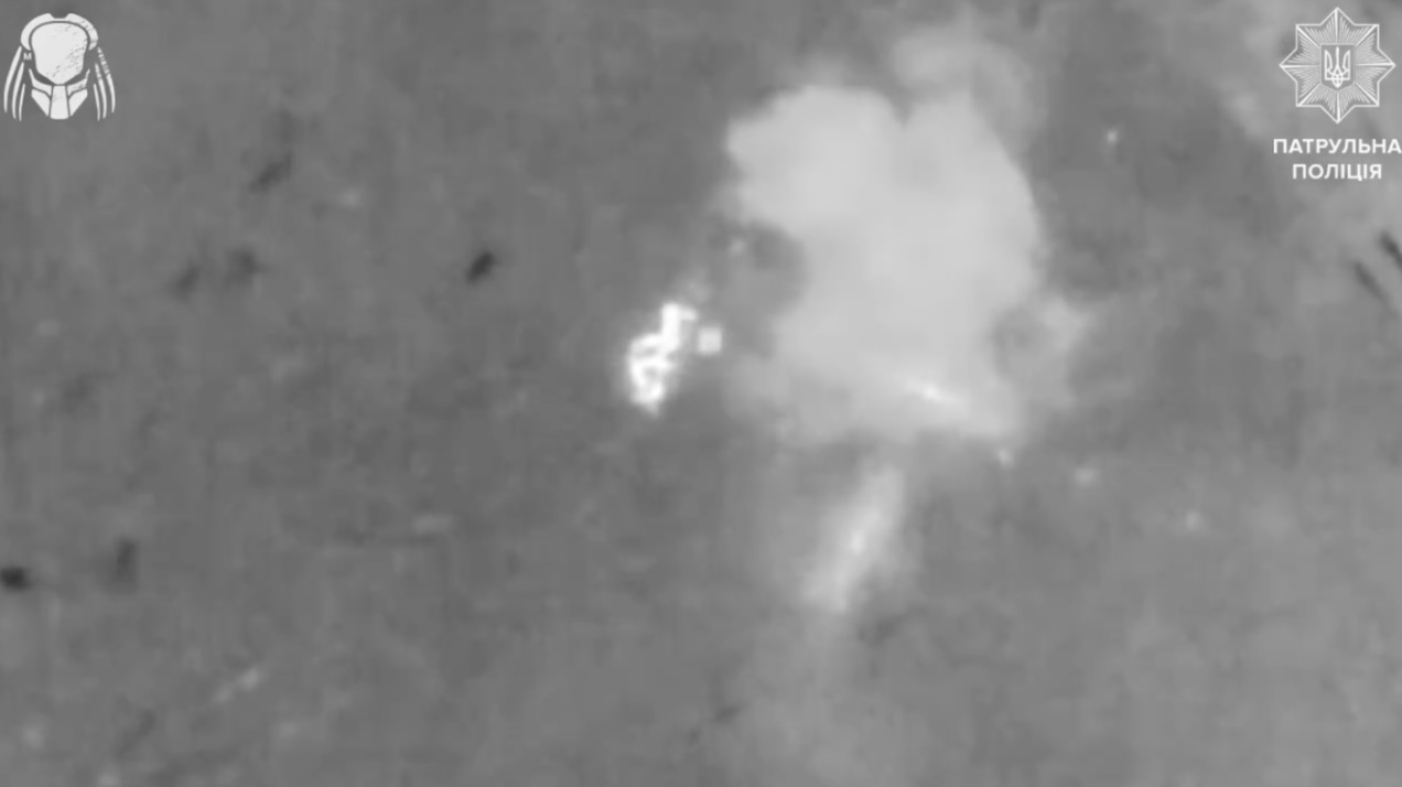 Russian is seen walknig from above via thermal camera. Drone drops grenade, which explodes several meters away. He falls down and later is seen apparently detonating his own
