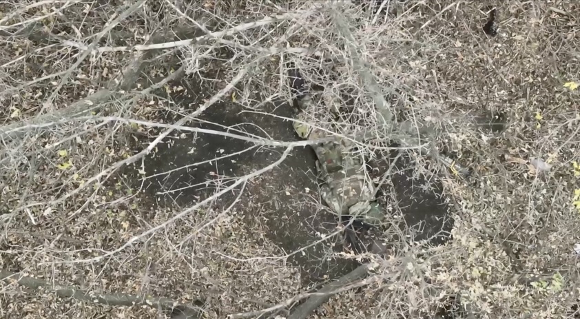 Russian face down on the ground appears to detonate grenade under himself