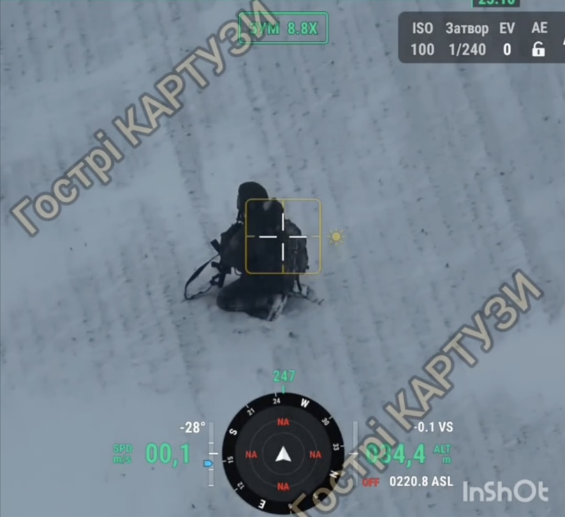 Fully equipped Russian soldier with no visible injury is walking slowly across the field covered with snow, kneels down and shoots himself as soon as he notices Ukrainian drone with no hesitation at all