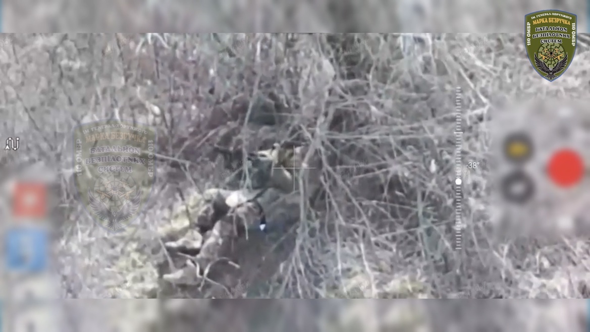 Russian receives direct FPV hit under the tree, grabs his AK, points at his chest and shoots