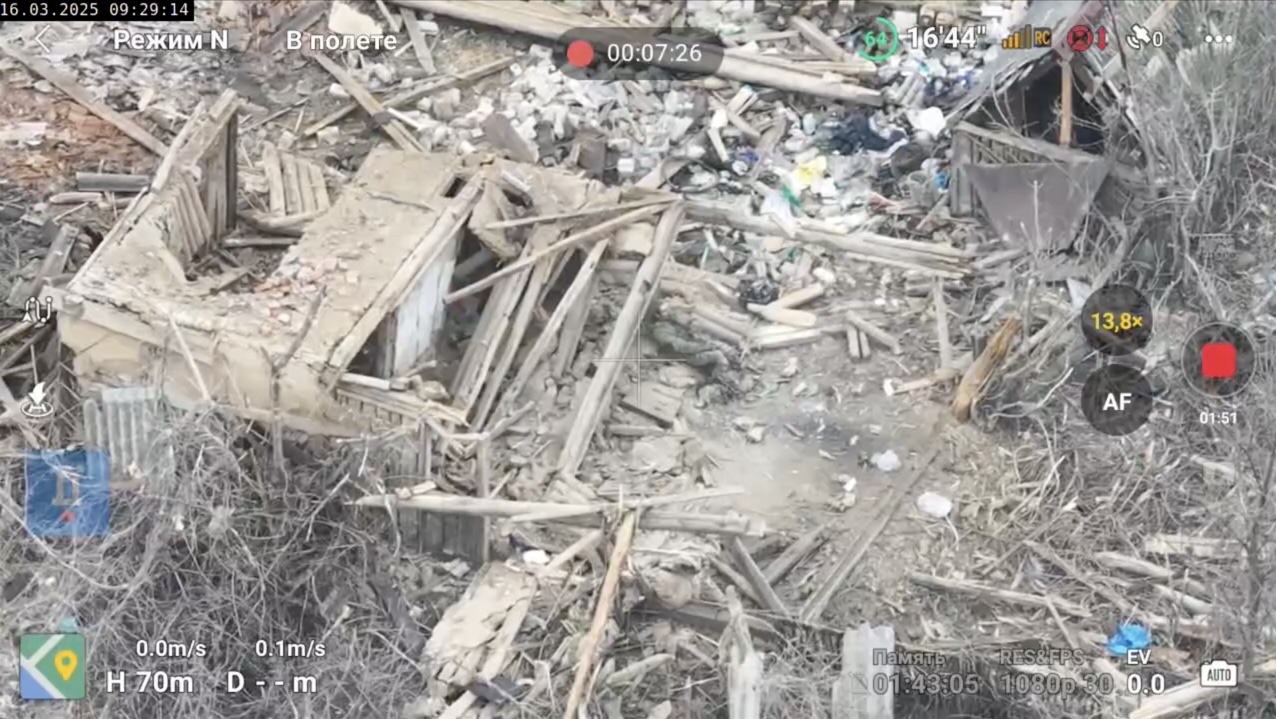 Apparently injured Russian crawls out of ruin in the middle of residential area, grabs his AK, makes test shot, leans back and shoots himself, his helmet blown away