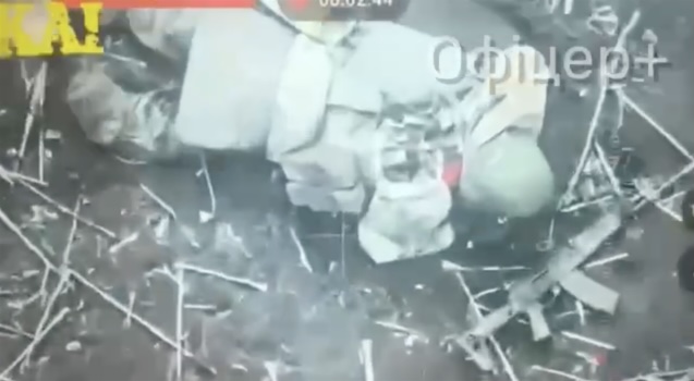 Russian is seen detonating grenade under his face, his head blown away