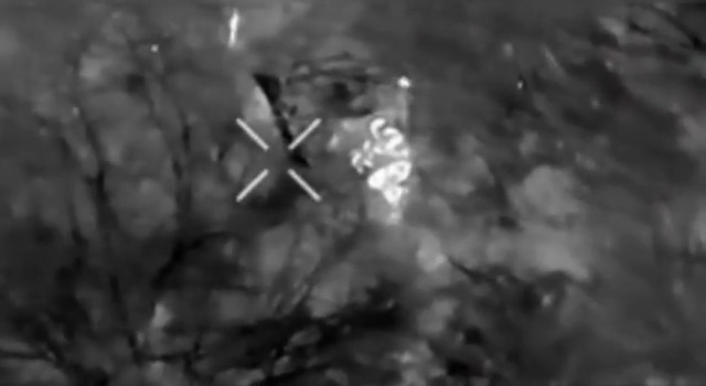 Russian soldier is wounded by grenade drop, shoots himself. Thermal view