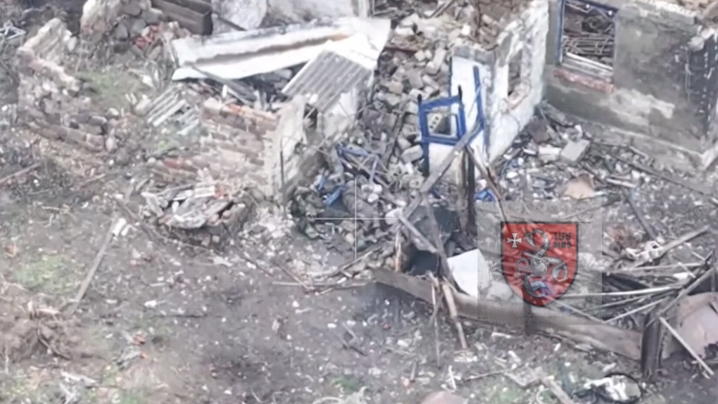Russian soldier is lying injured on the rubbles of destroyed private house, pulls pin on his grenade, rolls over it and detonates. He's not immediately dead though, and receives FPV hit soon after