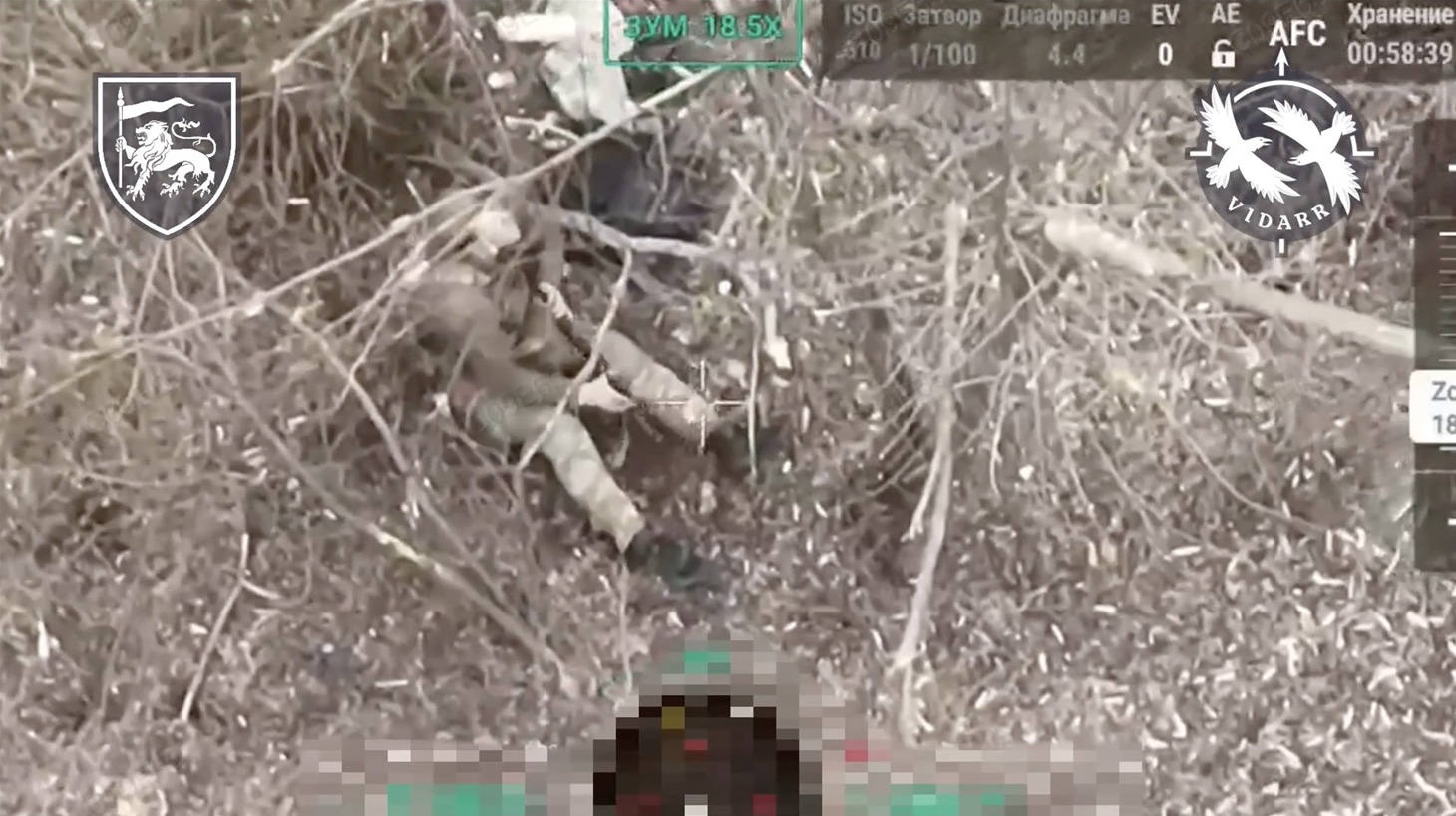 Russian sitting on the ground among trees with some sort of hat and no helmet is seen shooting himself with AK under his chin