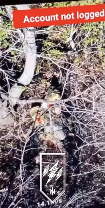 Russian is seen lying face up under the tree in the bright sun, pulling the pin on his grenade and detonating it. He seems to hold it in his hand away from face or body
