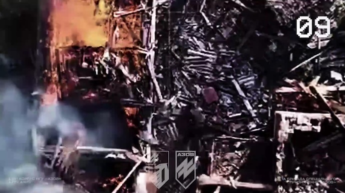 Same footage again but different scene. Russian walks out of burning ruin, falls down few meters away and explodes immediately