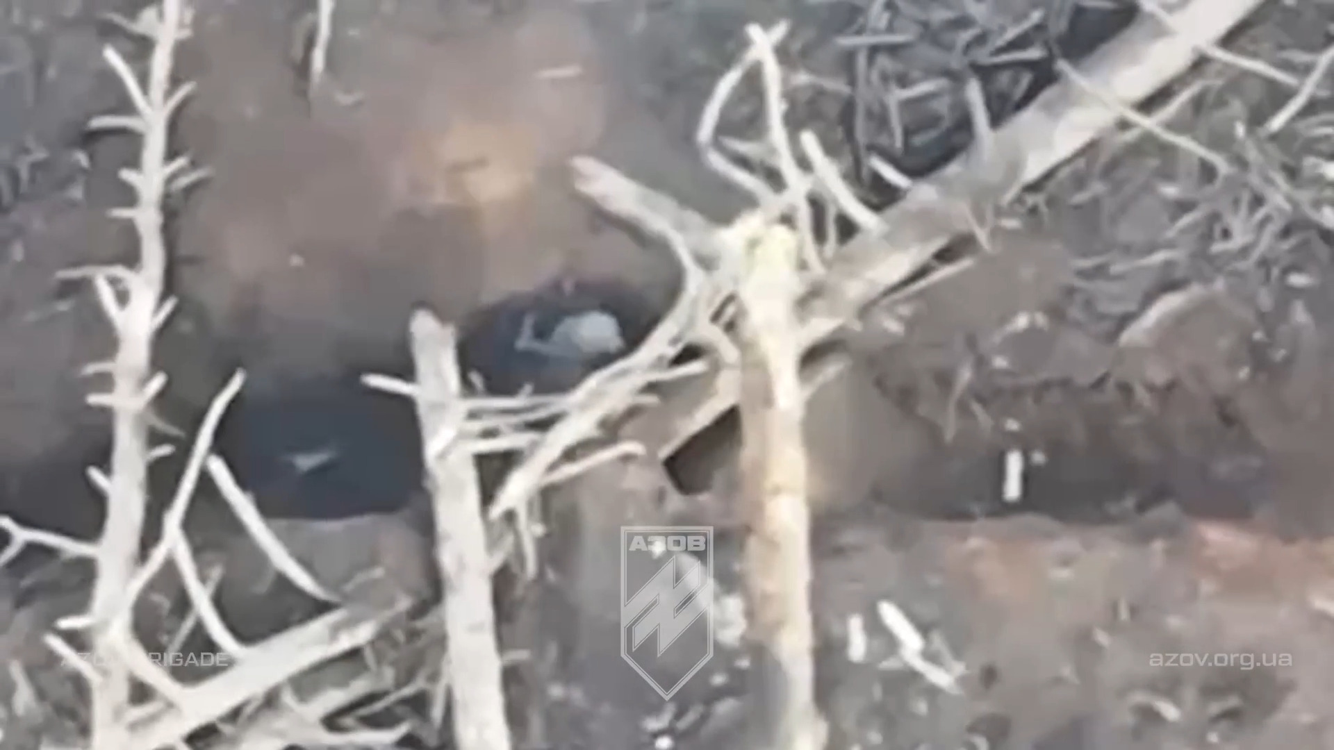 Grenade explodes near a Russian soldier in a trench, seconds later he shoots himself