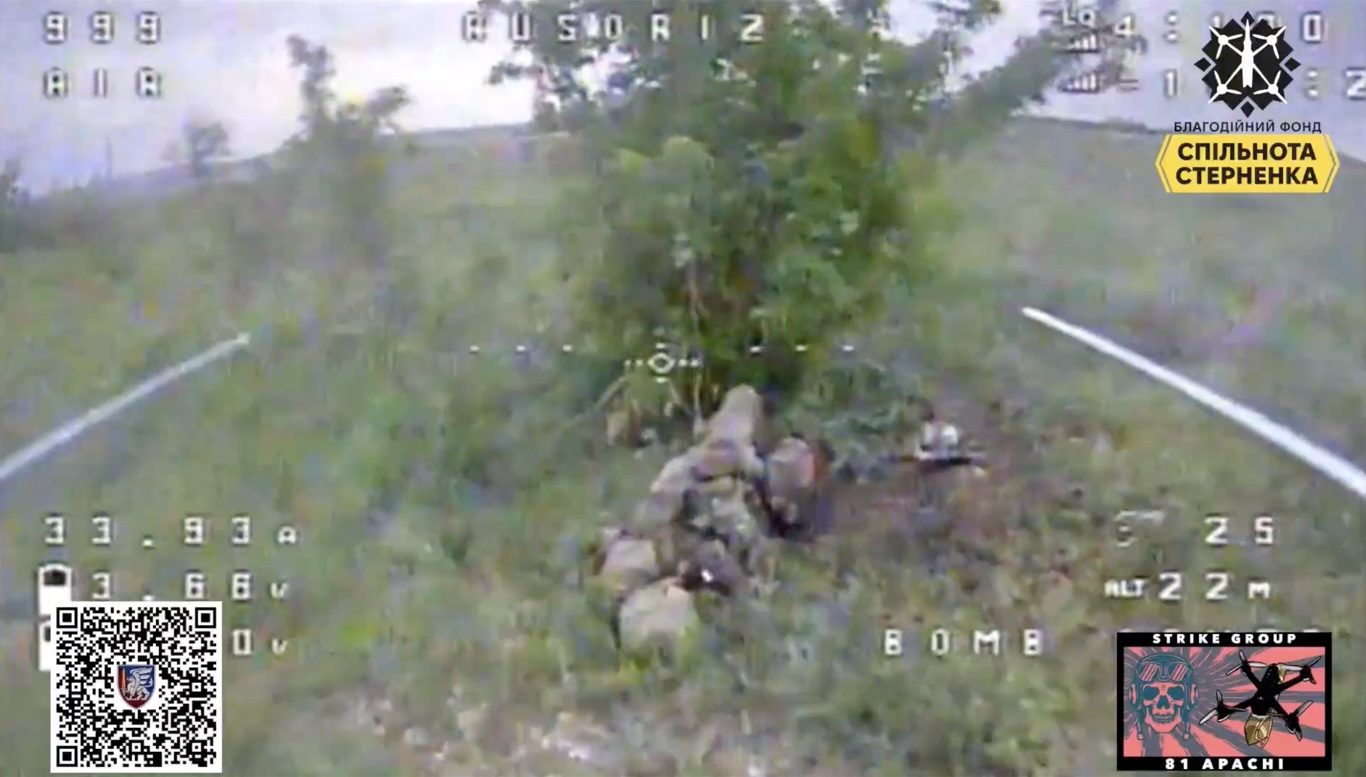 Russian soldier appears to be holding grenade next to his neck and detonating it moments before FPV hits, footage from the FPV that's hitting