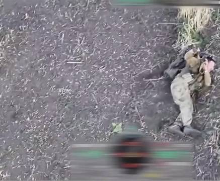 Apparently injured Russian lying on his side grabs his AK, takes his helmet off and shoots himself in the side of the head