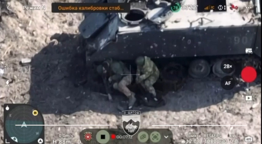 Russian soldier sitting beside dead comrade blows himself up with grenade