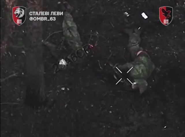 Russian shoots himslef while lying on the ground next to his dead comrade