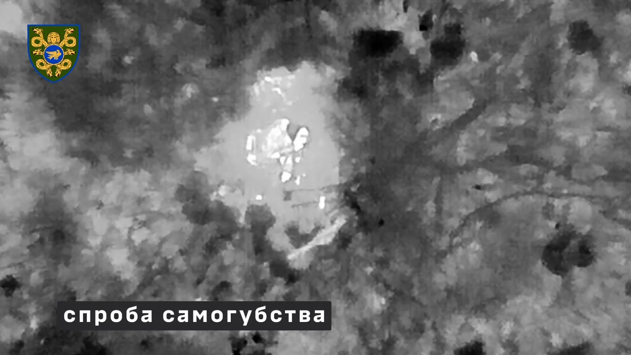 Russian soldier shoots himself after being wounded from a drone dropped grenade. Thermal view