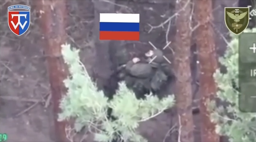 Same video as previous one, another fully equipped Russian with his backpack on shoots himself with AK pointed under his chin