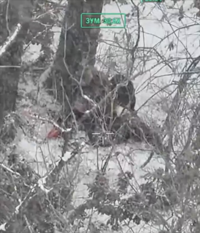 Same video as previous one, another fully equipped Russian with his backpack on shoots himself with AK pointed under his chin