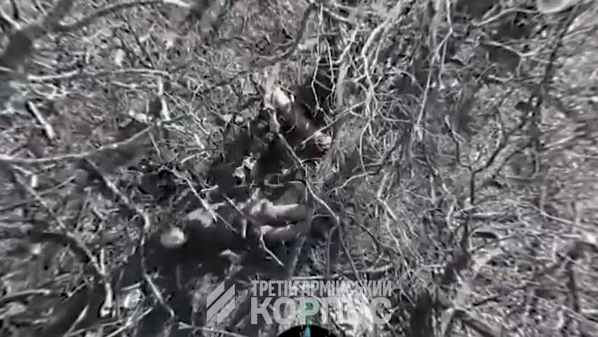 Quick video cut featuring Russian shooting himself and falling on his back, seen right from above