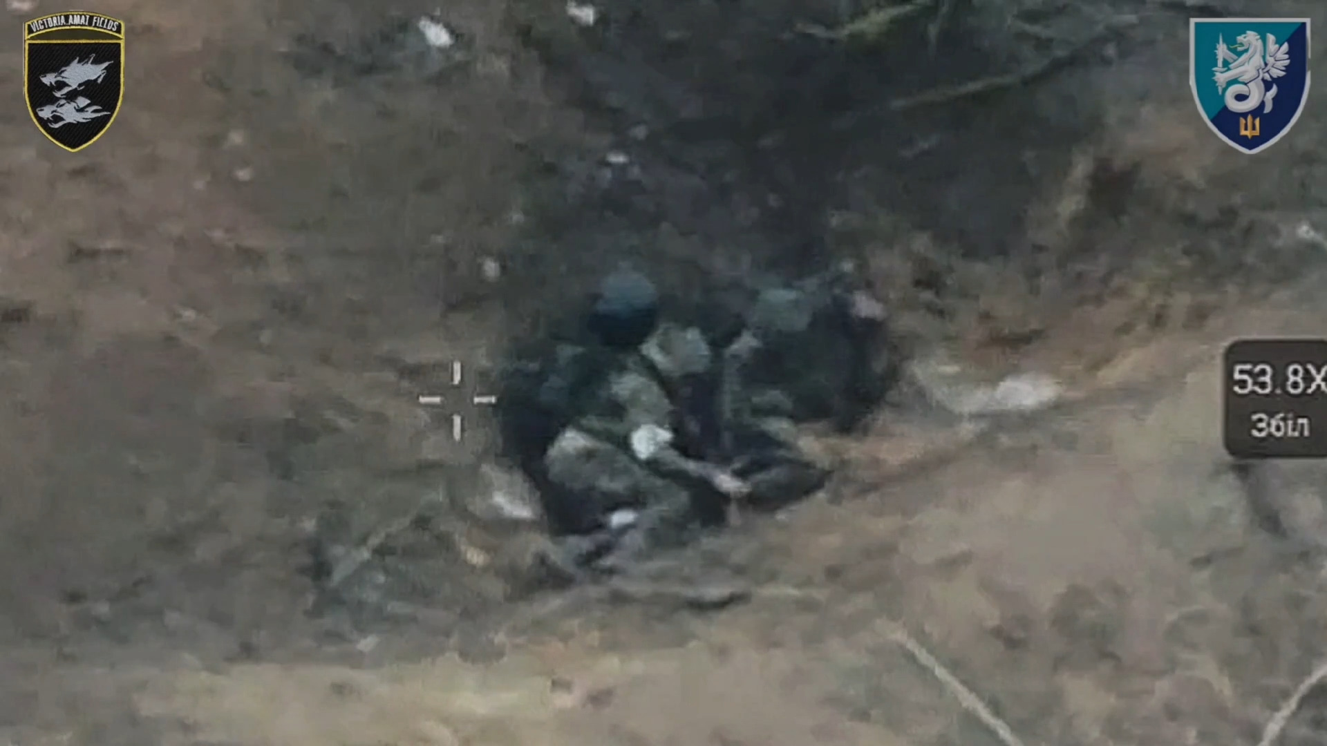 Two Russian soldiers are wounded by artillery. One appears to mercy kill his comrade before unsuccessfully shooting himself