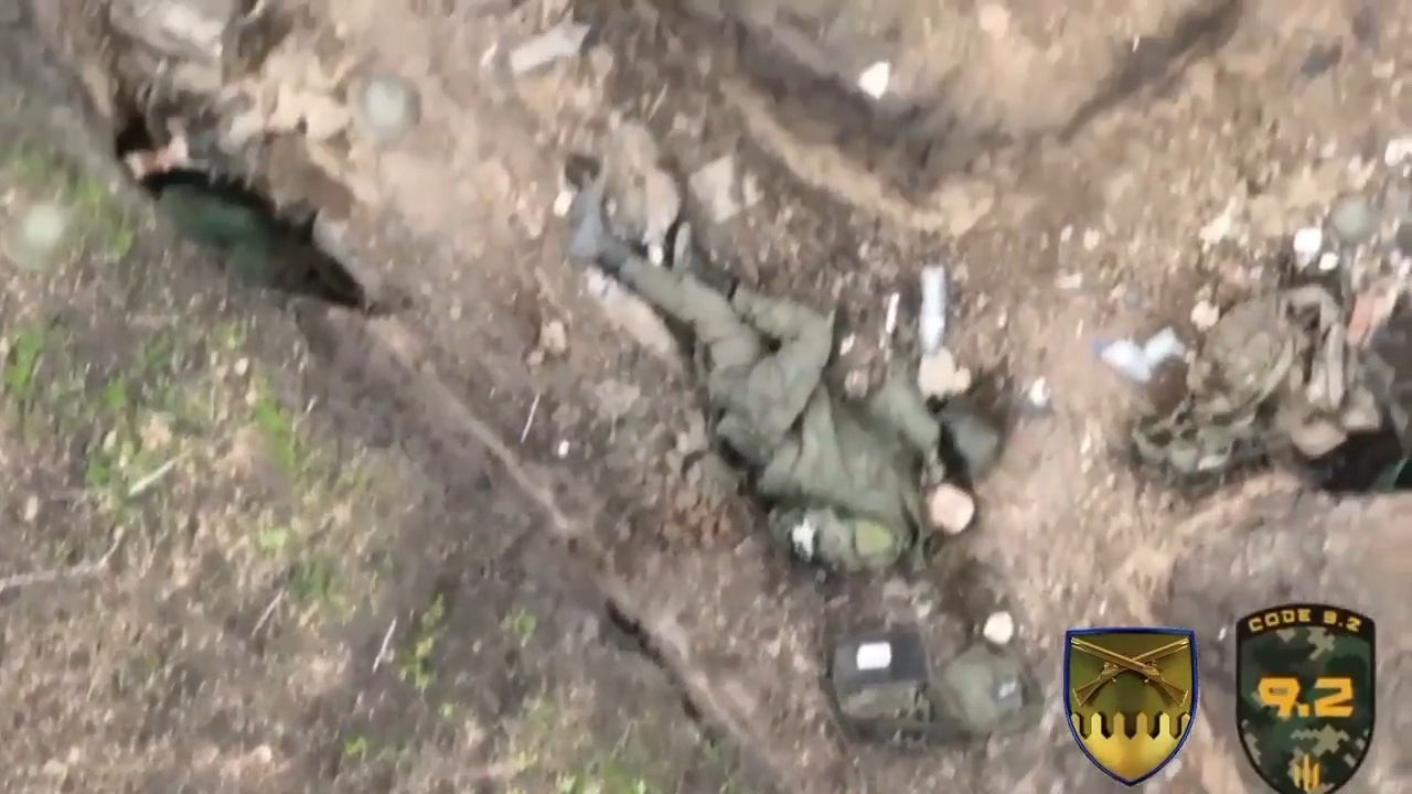 Russian soldier in trench is wounded by multiple drone drop grenades. Puts grenade to his own head