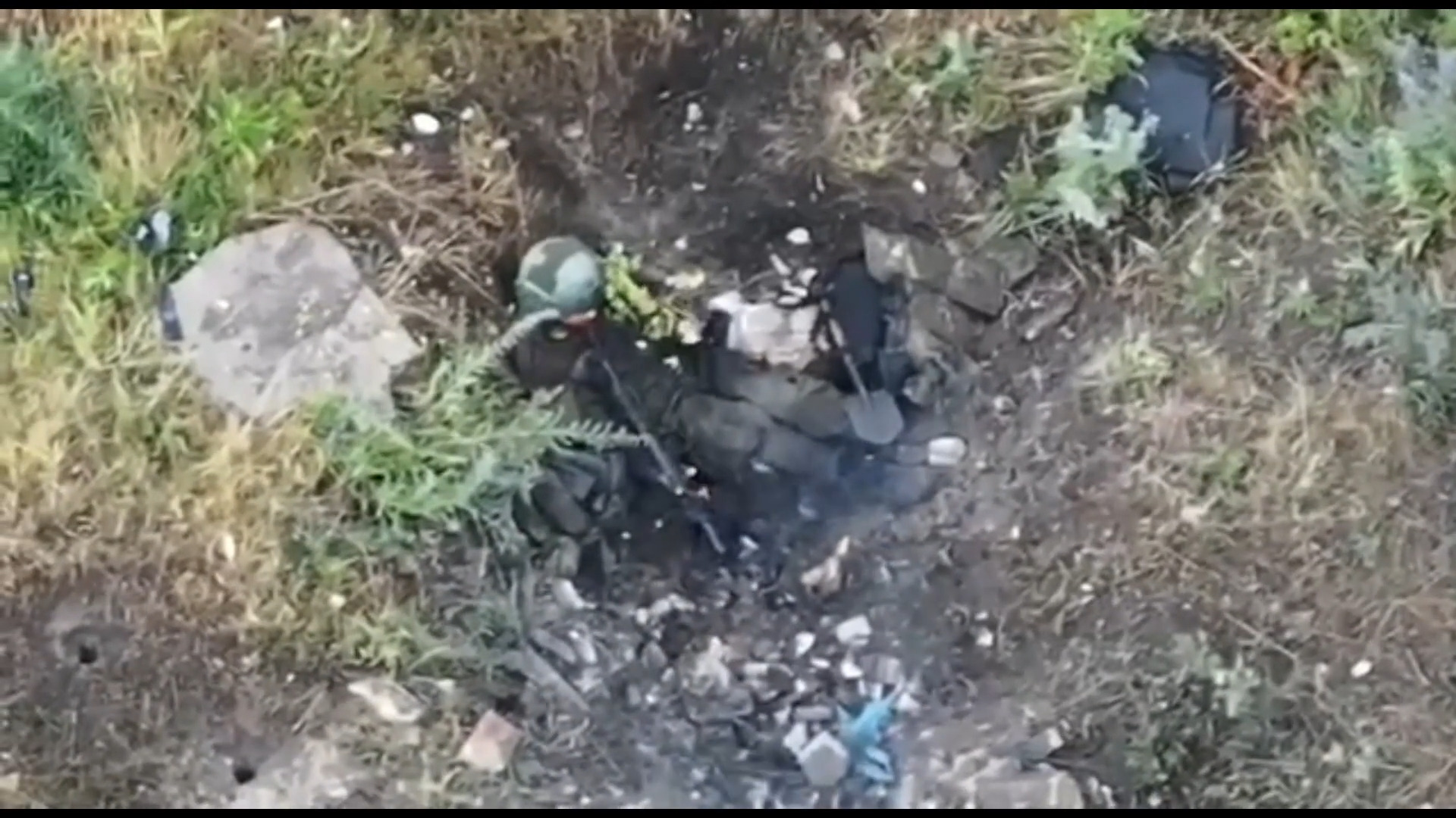 Wounded Russian tries to shoot himself with his rifle but appears unable due to his wounds